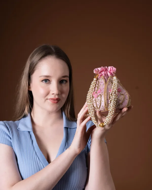 The_Blush_Lotus–_Handcrafted_Pearl_Handle_Evening_lotus_Potli_Bag